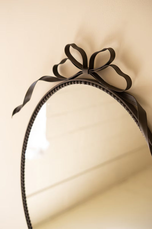 Black Oval Mirror with Bow Detail