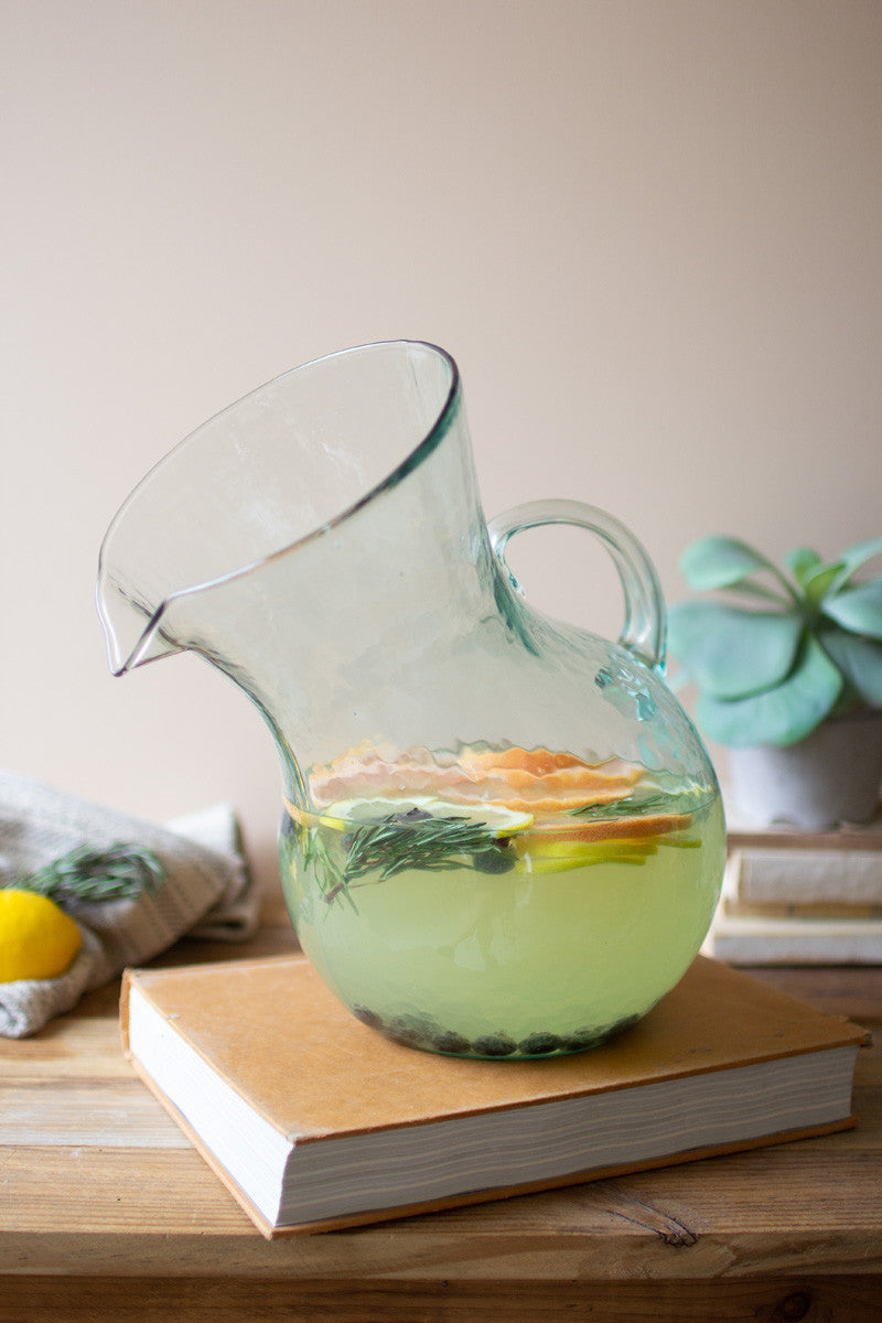 large glass tilted pitcher