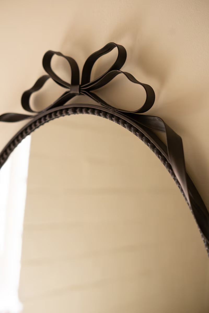 Black Oval Mirror with Bow Detail