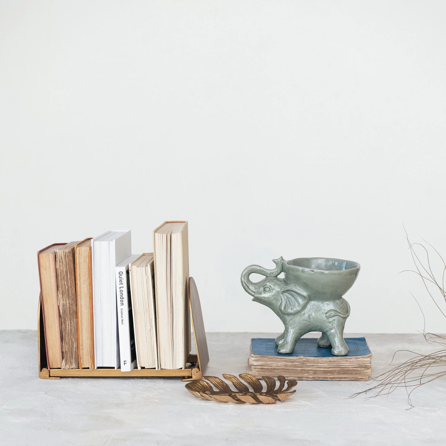 Adjustable Metal Book Rack in an Antiqued Gold Finish