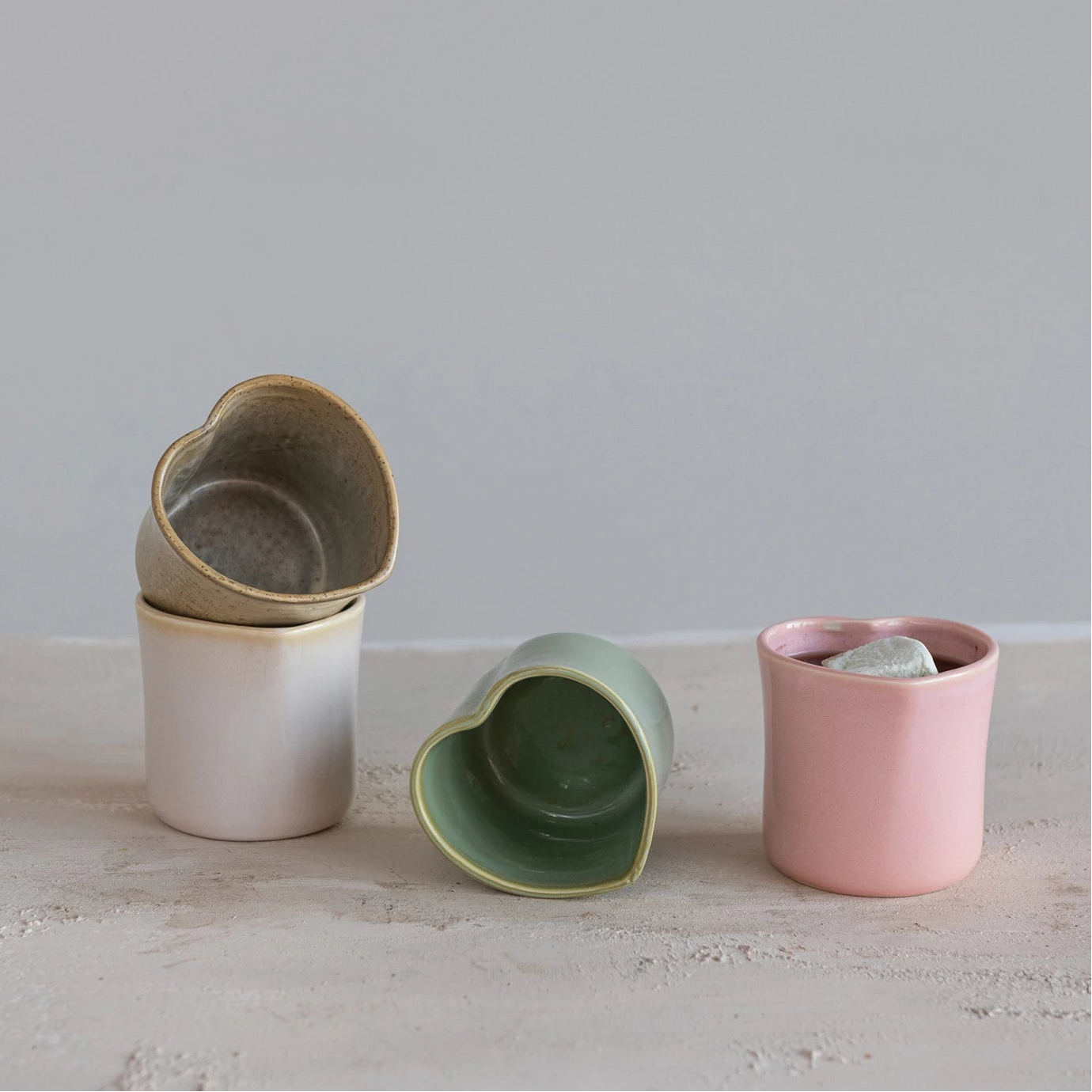 Stoneware Heart Shaped Handle-less Mug, Four Colors